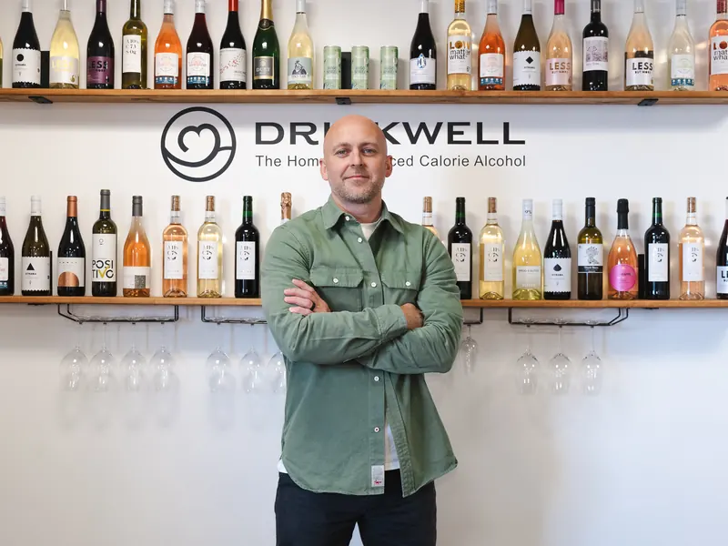 Tom Bell in front of the DrinkWell range